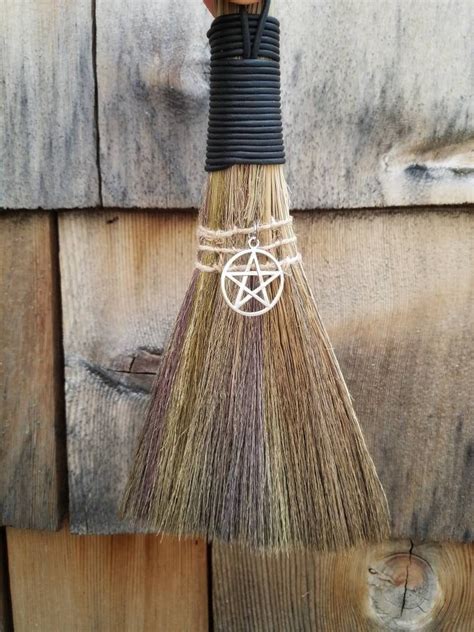 Wicca broomstick emblem
